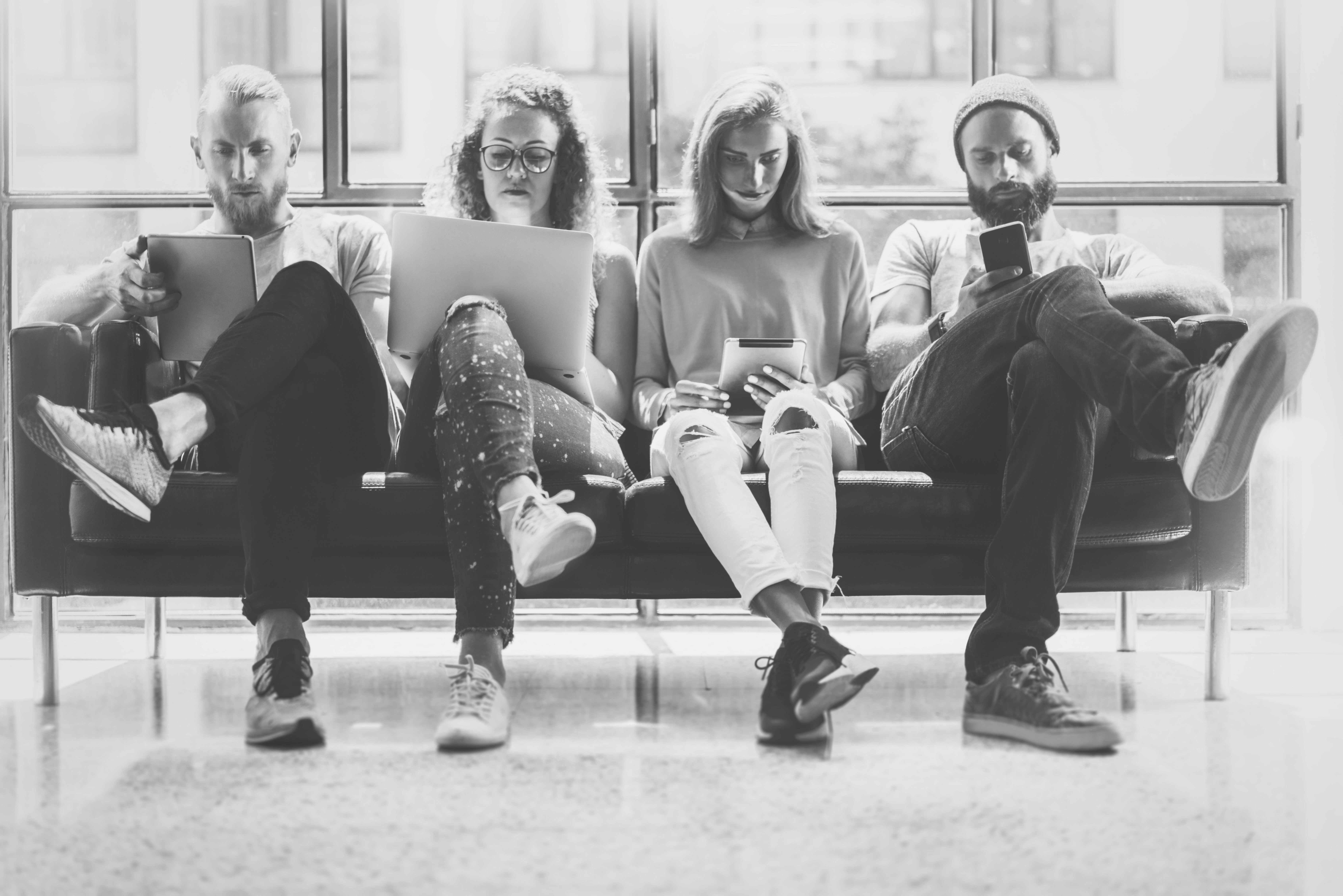 Group of people using laptop
